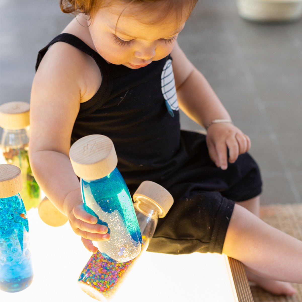 Bouteille Sensorielle Float - Bleu - Lina et Compagnie