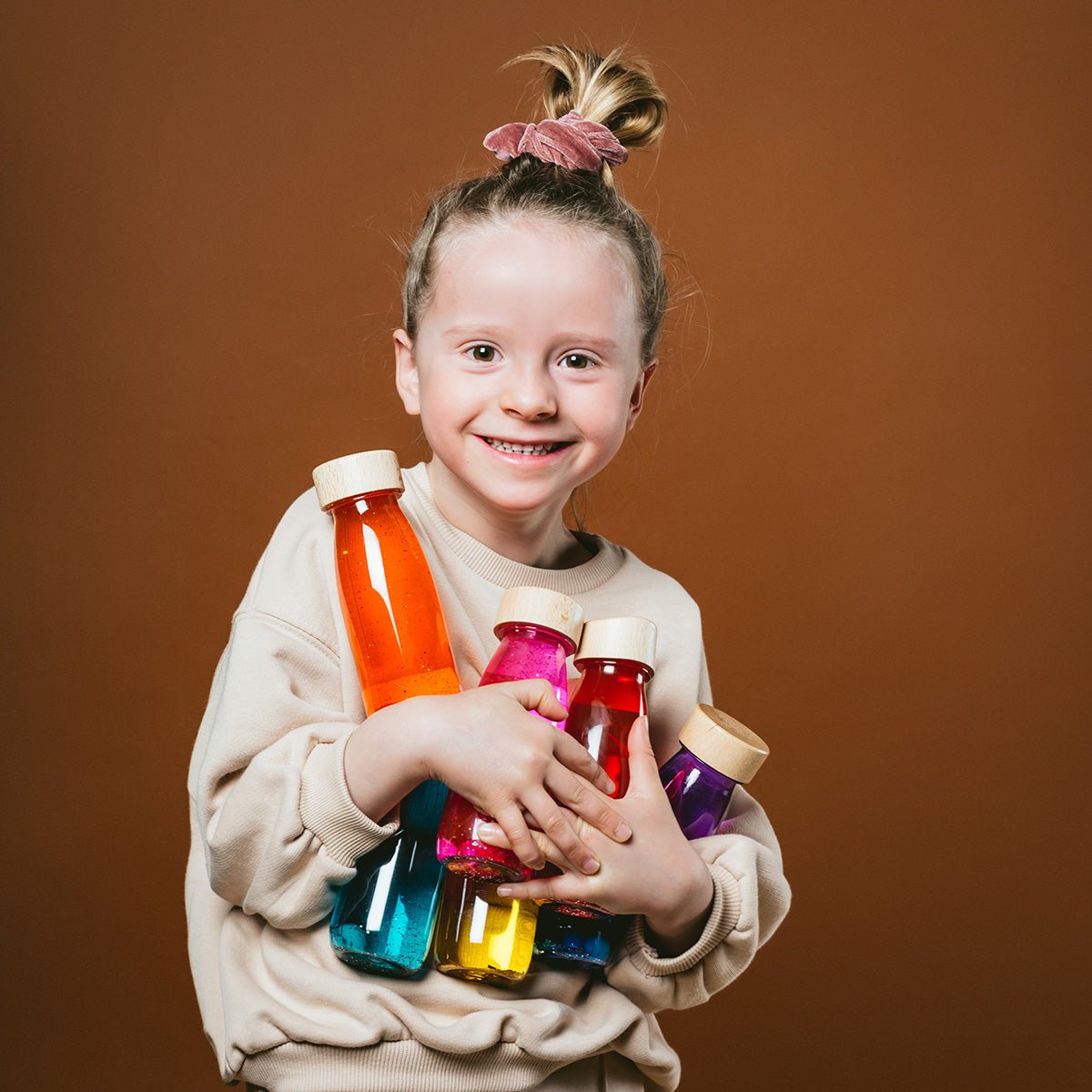 Bouteille Sensorielle Float - Orange - Lina et Compagnie