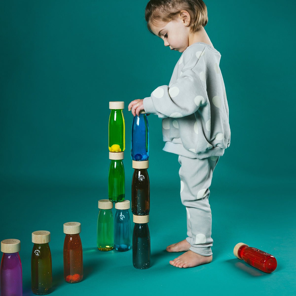 Bouteille Sensorielle Float - Orange - Lina et Compagnie