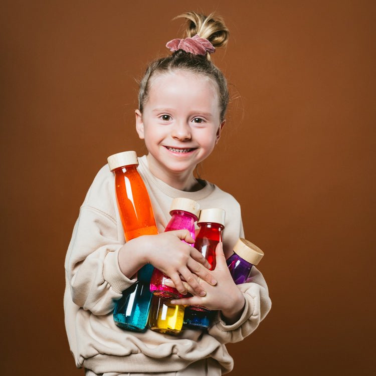 Bouteille Sensorielle Float - Rouge - Lina et Compagnie